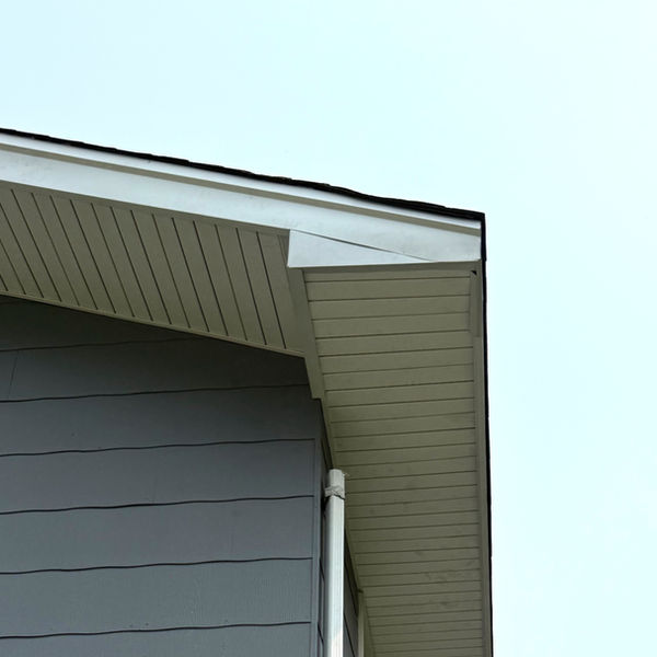 Newly installed white fascia and soffit by Barry's Gutter and Home Repair